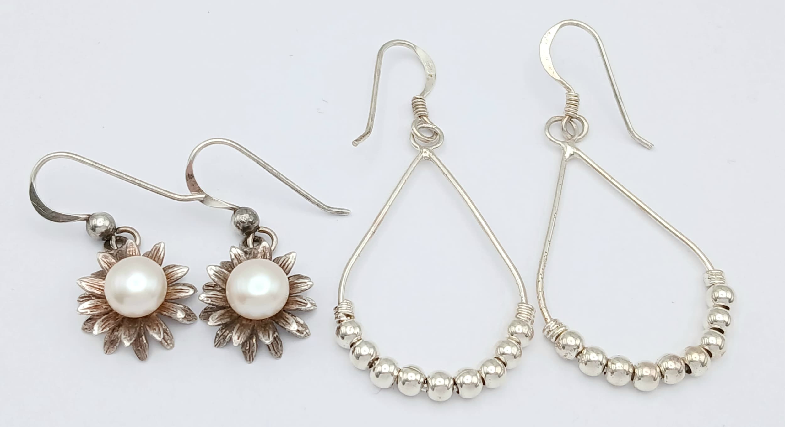 2X pairs of 925 silver stone set earrings. Total weight 5.3G