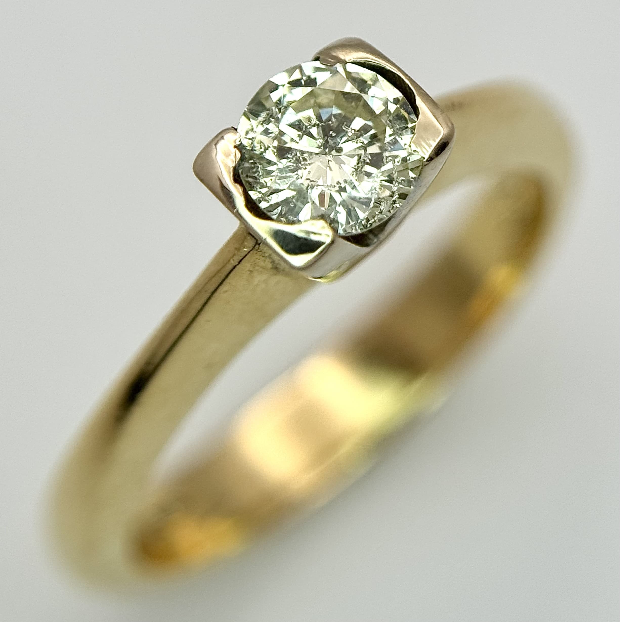 An 18K Yellow Gold 0.5ct Diamond Solitaire Ring. Size O 1/2, 6.1g total weight. Ref: NL18/84005
