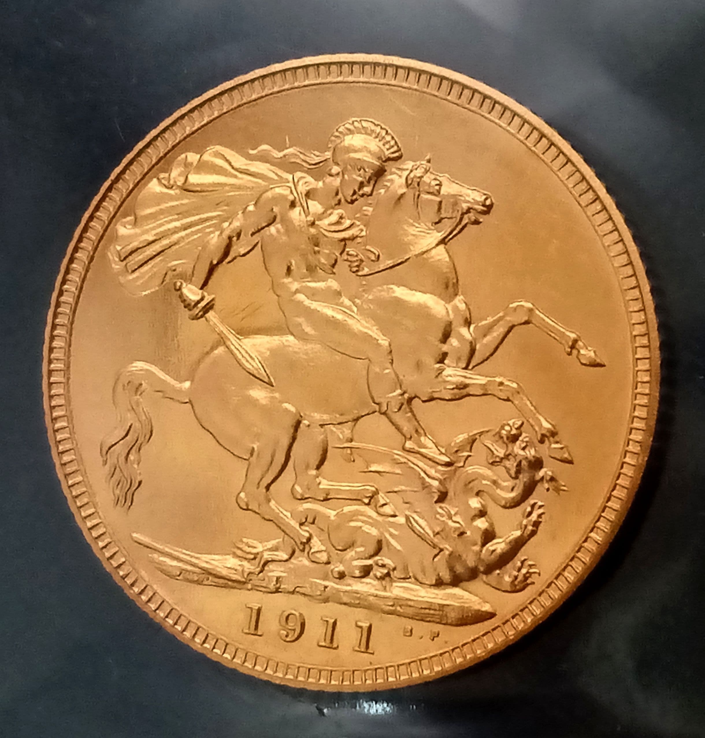 A 1911 George V Proof Full Sovereign Coin. 22K Gold.