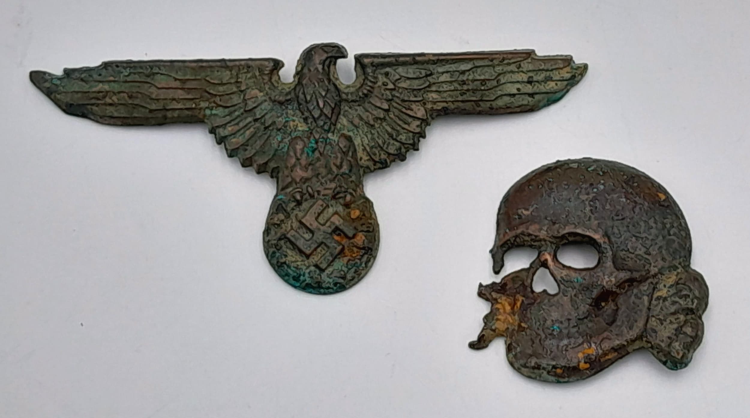 Battlefield Relic Waffen SS Cap Eagle & Skull Found Near Falaise, Normandy France. A few of these and other items have been found over the years when a hedge row was moved by a landowner. Most likely taken from P.O.W’s