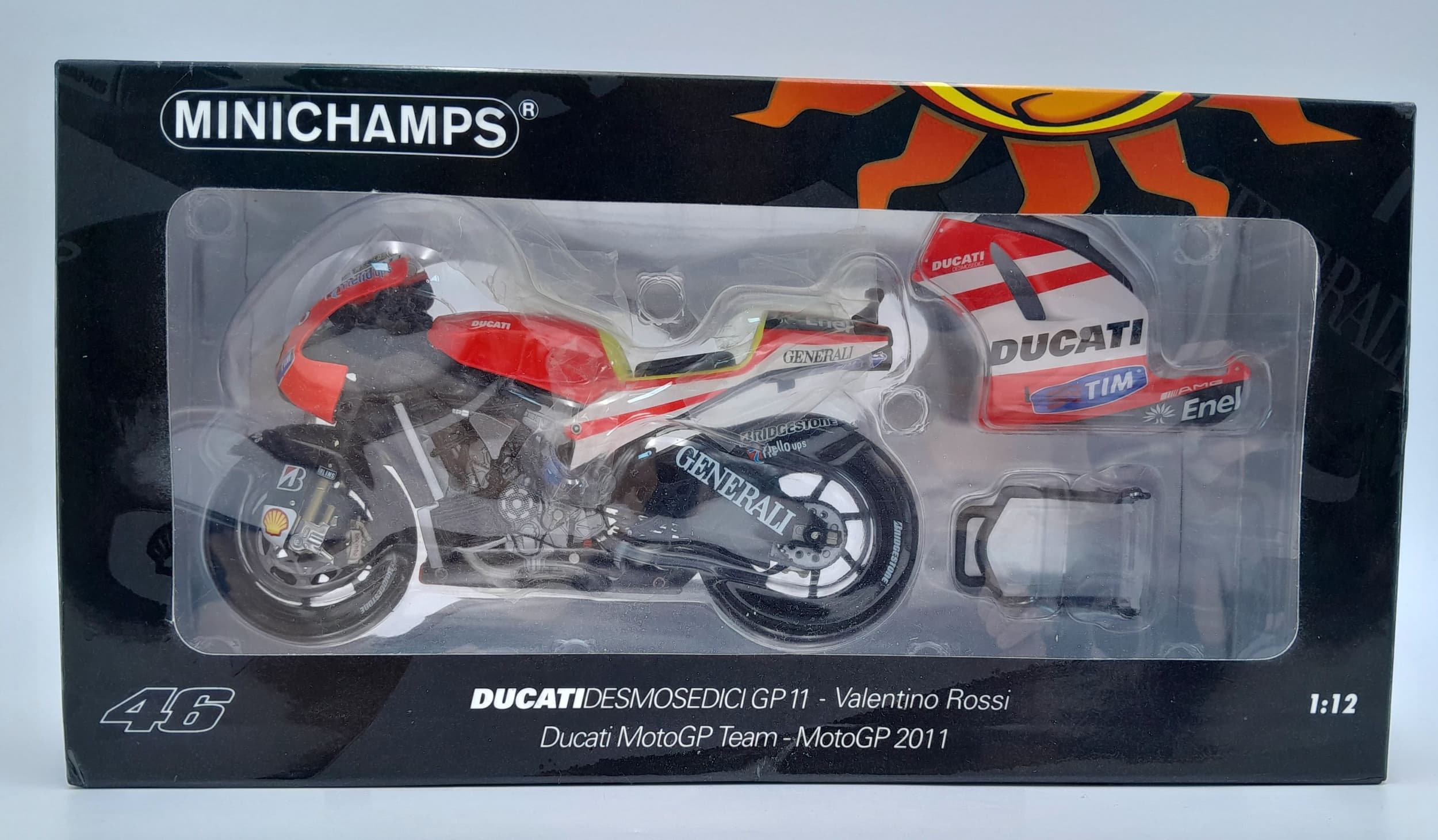 A Minichamps 1/12 scale Ducati Desmosedici GP11 (Valentino Rossi) model. Mint in box.