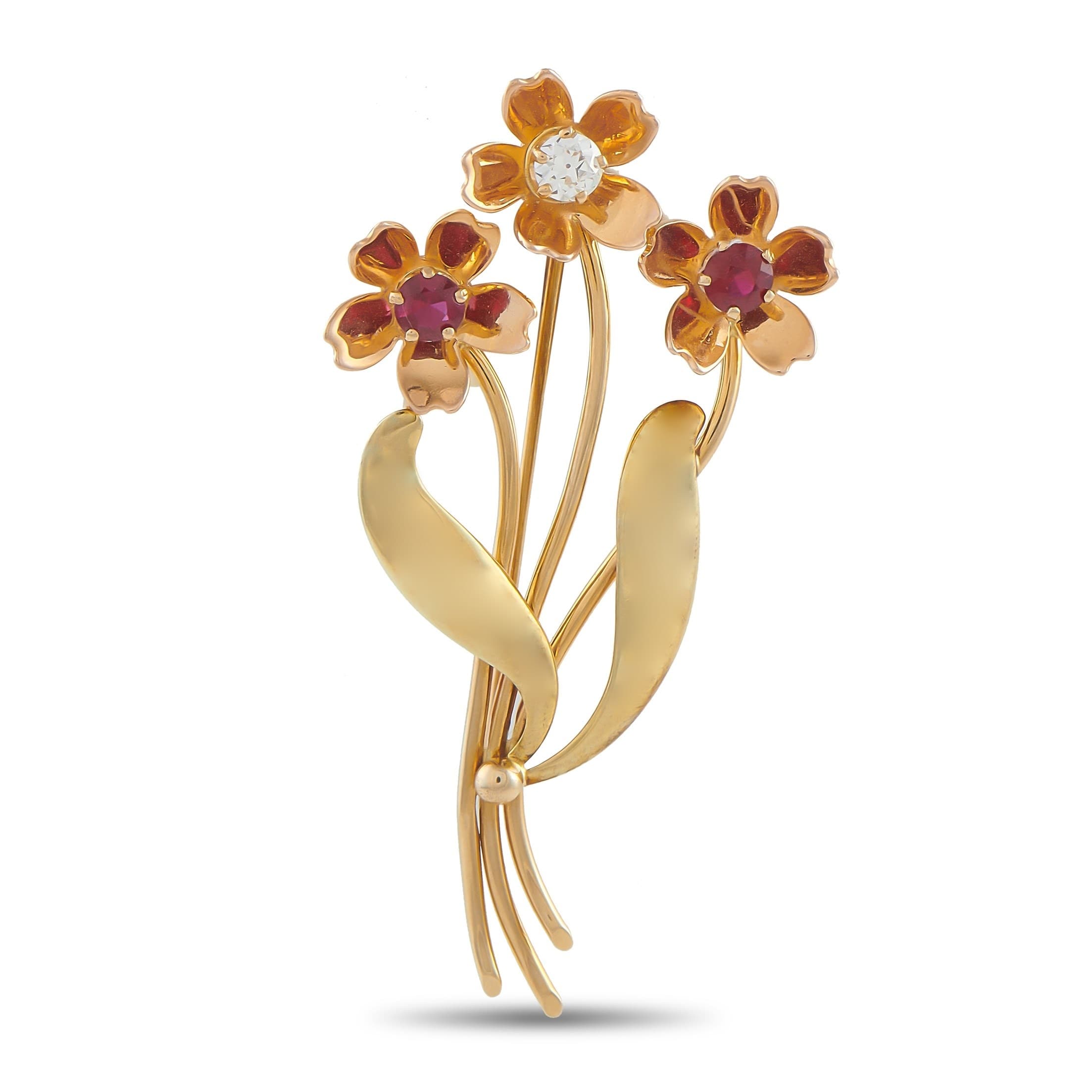 A Tiffany & Co. Vintage 14K Yellow Gold 0.50ct Diamond and Ruby Flower Brooch. The trio of flowers in 14K Yellow Gold features a 0.50 carat Diamond center stone and Ruby accents with a total weight of 1.0 carats. It measures 2.82 long by 1.82 wide. Good Condition and includes a gift box. Total weight: 11.3 grams. *This item is held at Cadmore USA Office in Pennsylvania, USA and will be shipped from there. Buyers will be responsible for direct shipping payments.*