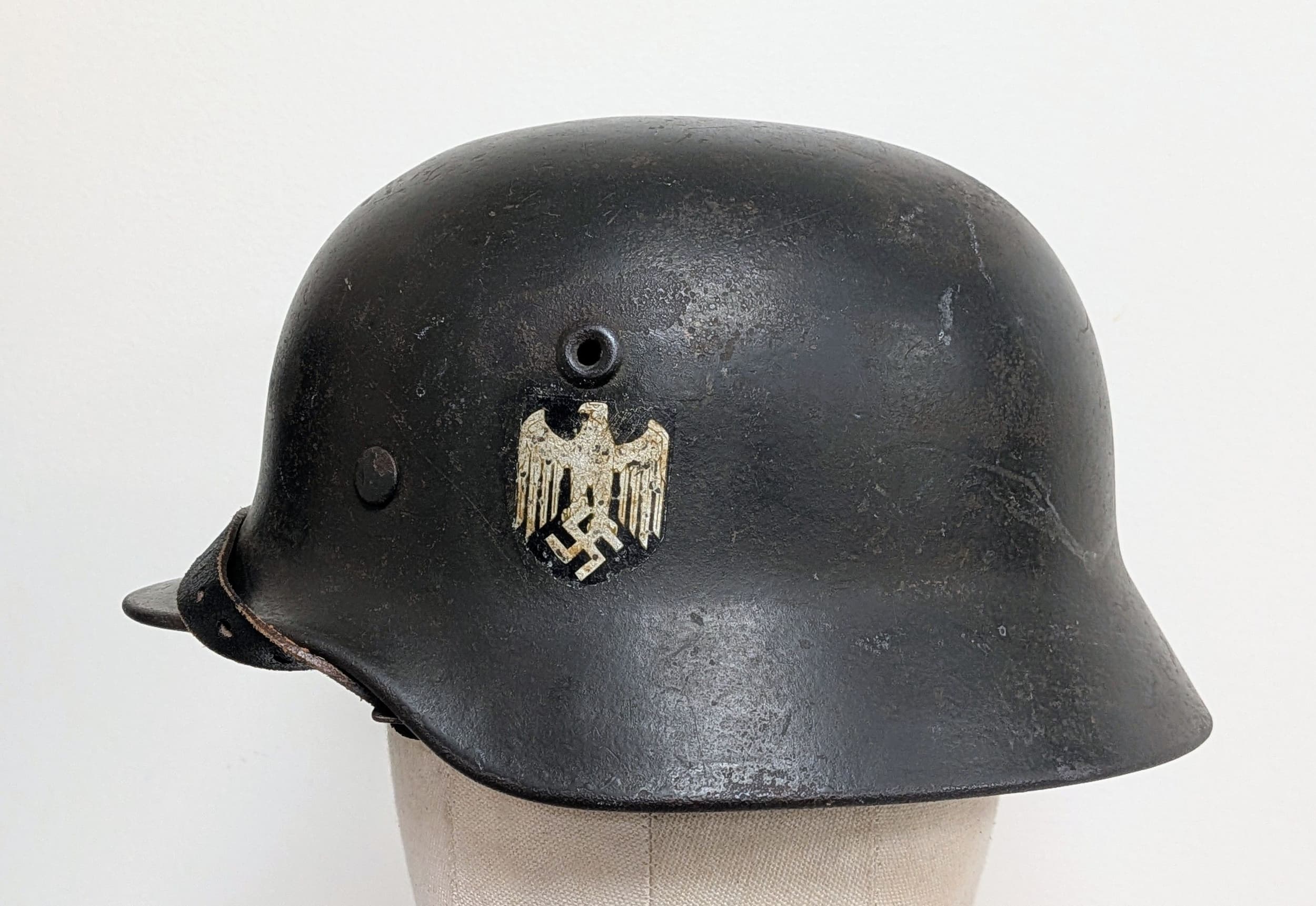 WW2 German M40 Single Decal Heer Helmet with liner and a 1937 Dated Chinstrap