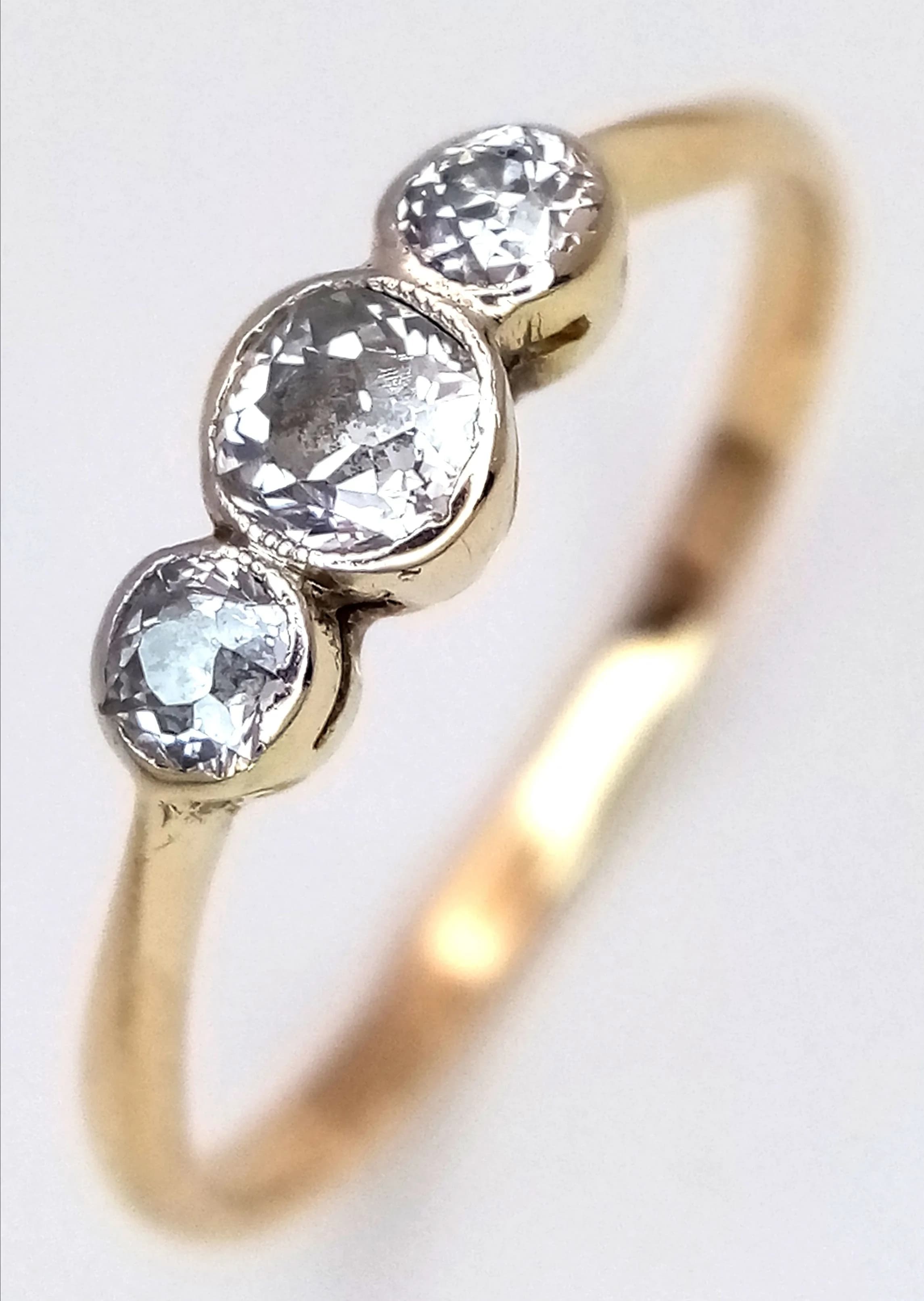 AN 18K YELLOW GOLD, DIAMOND SET, 3 STONE RING. 0.40CTW. 1.7G, SIZE O/P. SC 5117