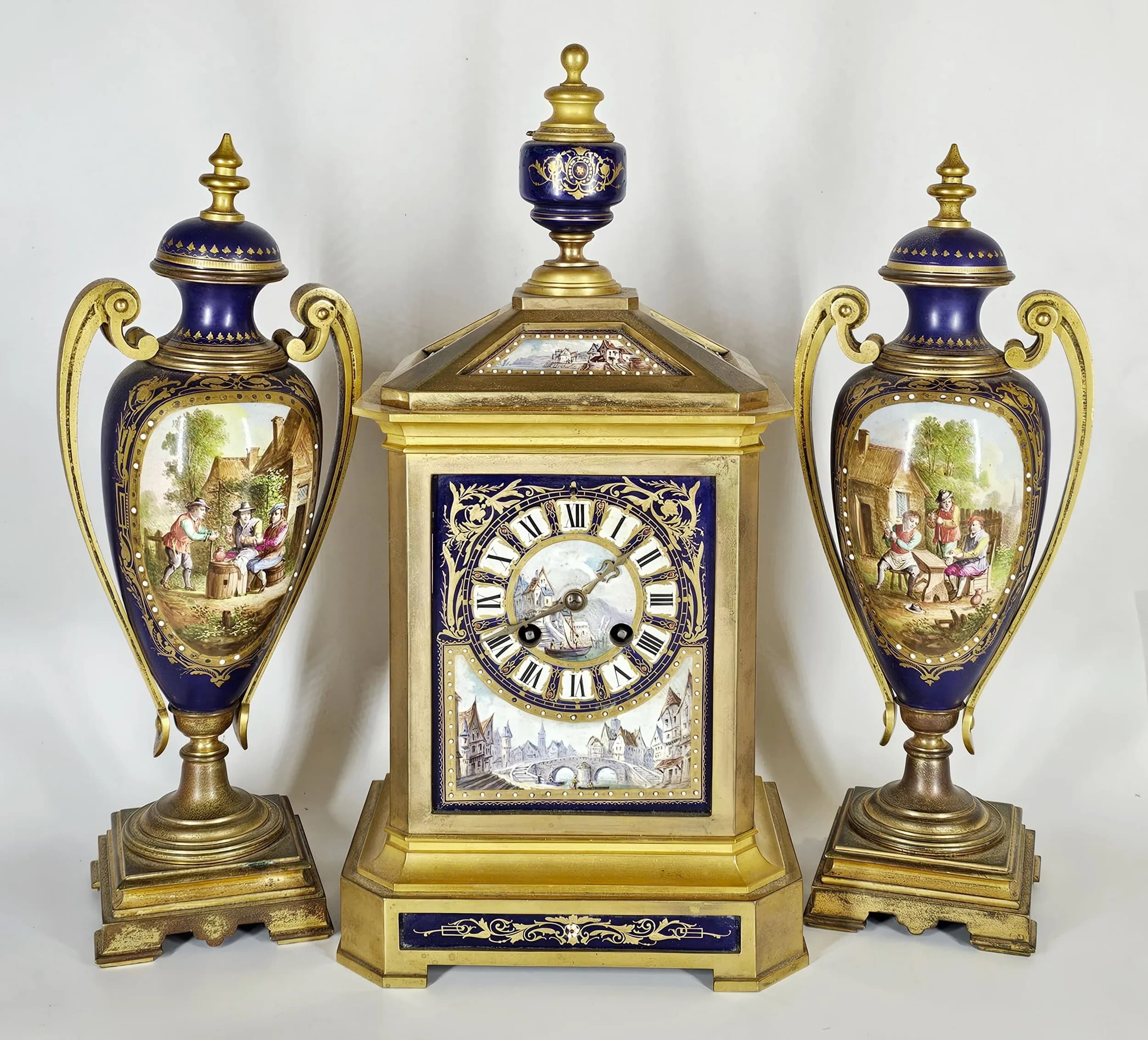 An Antique 19th Century French Sèvres Porcelain and Bronze Garniture Mantel Clock Mantel Clock Set. Winning bidder must collect from Cadmore HQ or arrange a courier.
