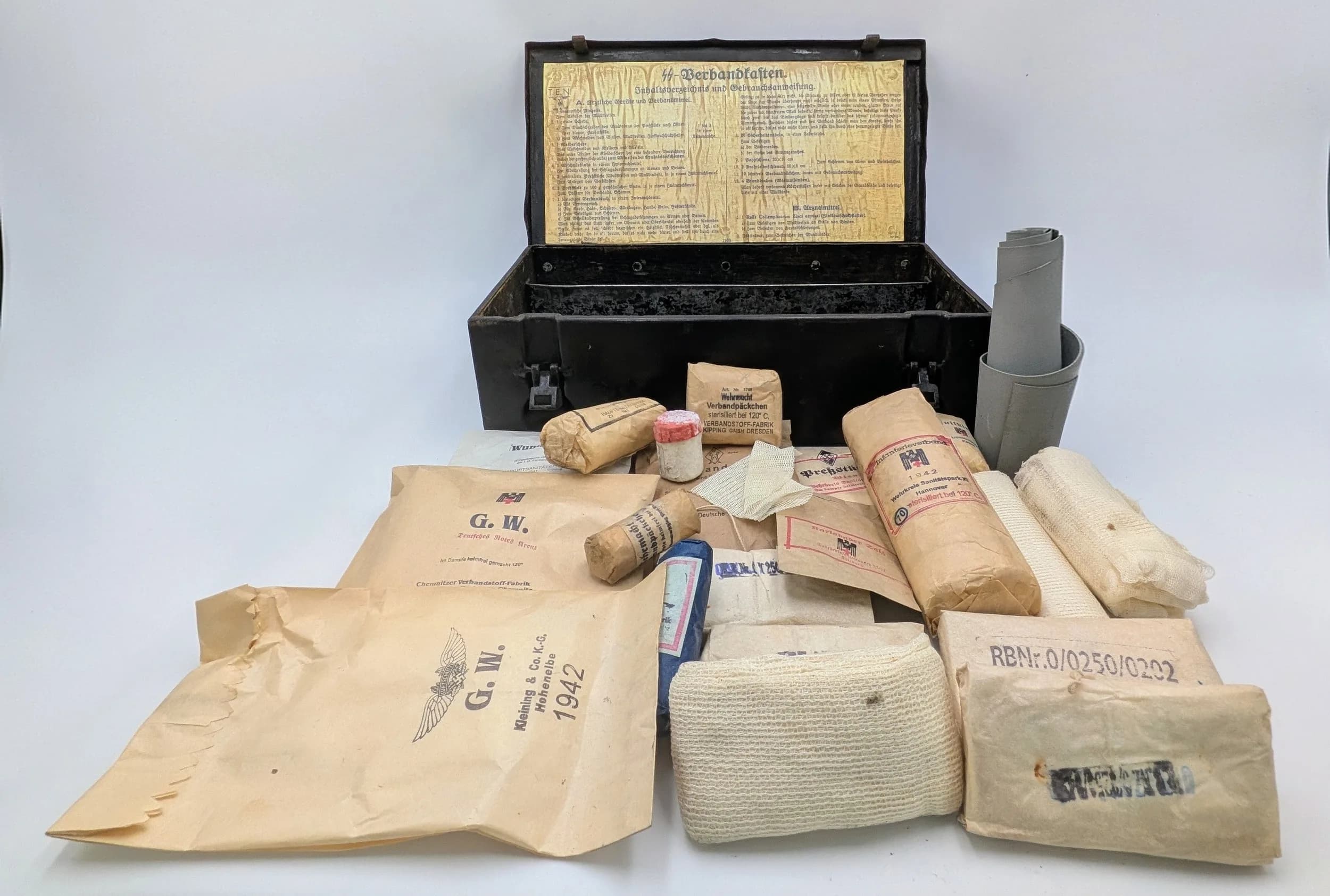 1939 Dated Waffen SS First Aid Tin with mixture of Wartime Dressings etc