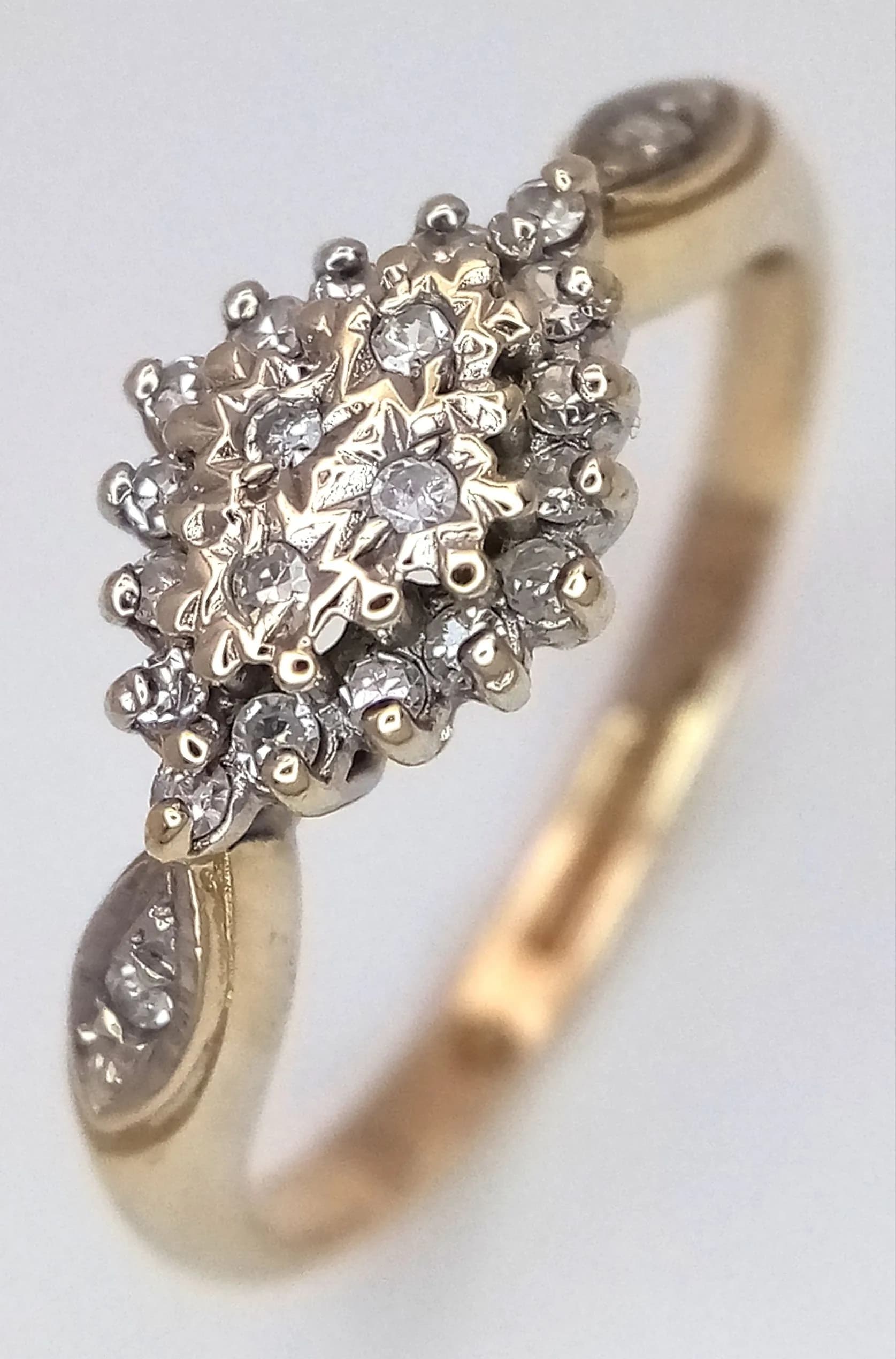 A 9K YELLOW GOLD, DIAMOND SET, CLUSTER RING. 1.8G. SC 5023