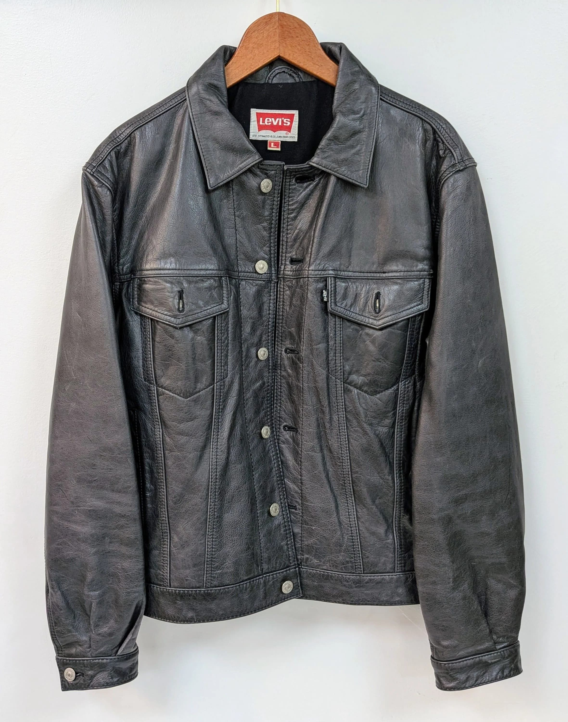 A Vintage Levi's Leather Truckers Jacket. Lightly worn and well-aged. Bought in Sweden many moons ago. Size Large.
