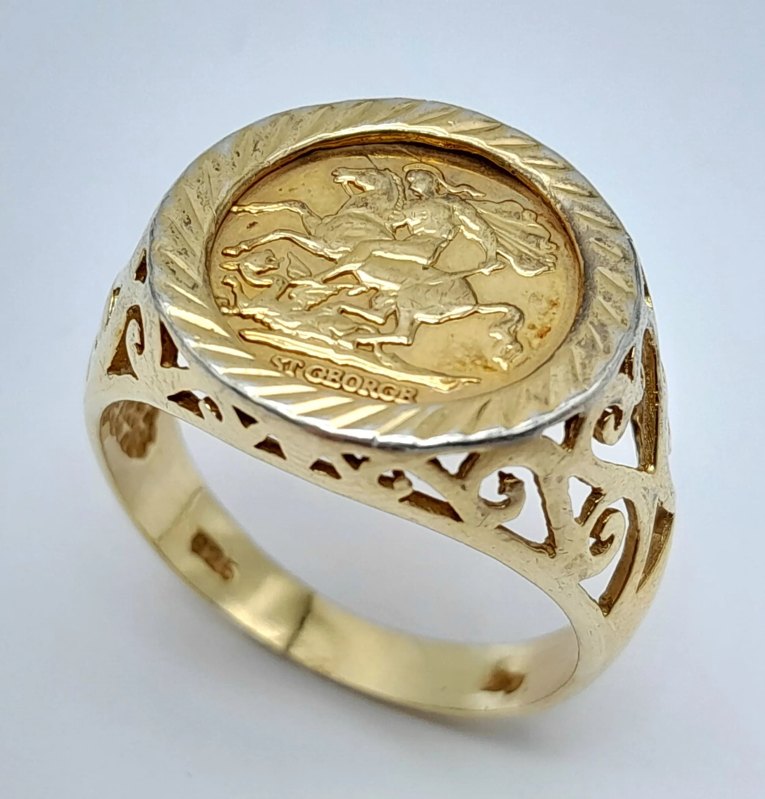A Vintage Gold Gilded Sterling Silver St. George and the Dragon Signet Ring. Size V. The Ring measures 1.6cm wide at the crown and has a gross weight of 6.01 grams