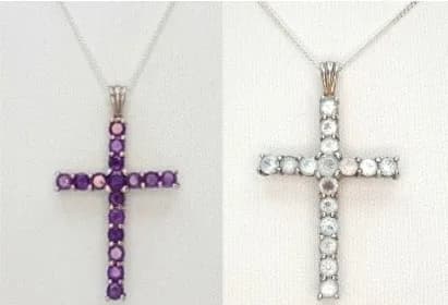 A Beautiful Sterling Silver Double Sided Aquamarine and Amethyst Cross Pendant Necklace. The Cross can be worn either side around and measures 3.7cm Length. Set with sixteen 3mm Round cut Aquamarines and sixteen round cut top colour Amethysts. Total approximately 3.2 to 3.5 carat total. The Necklace weighs 5.82 grams.