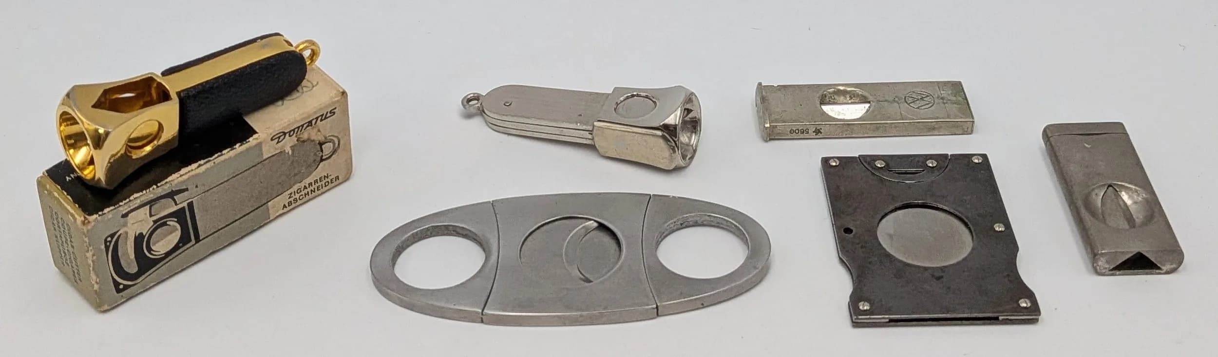 Really nice selection of vintage CIGAR CUTTERS to include Boxed SOLINGEN DONATUS Pocket Size in as new Condition. Please see pictures.