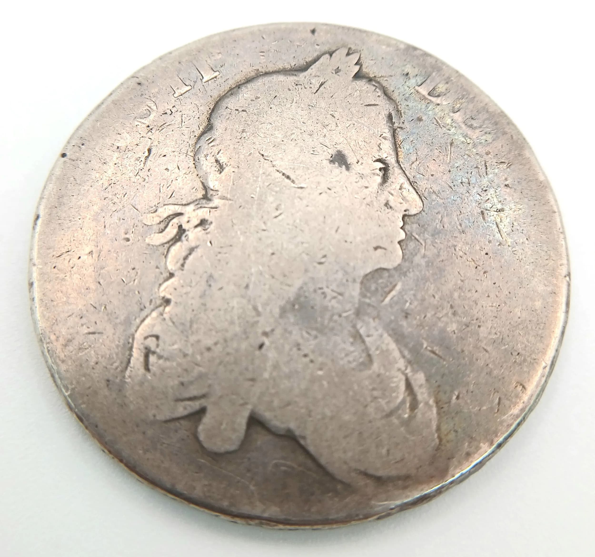 A 1677 Charles II Silver Crown coin.