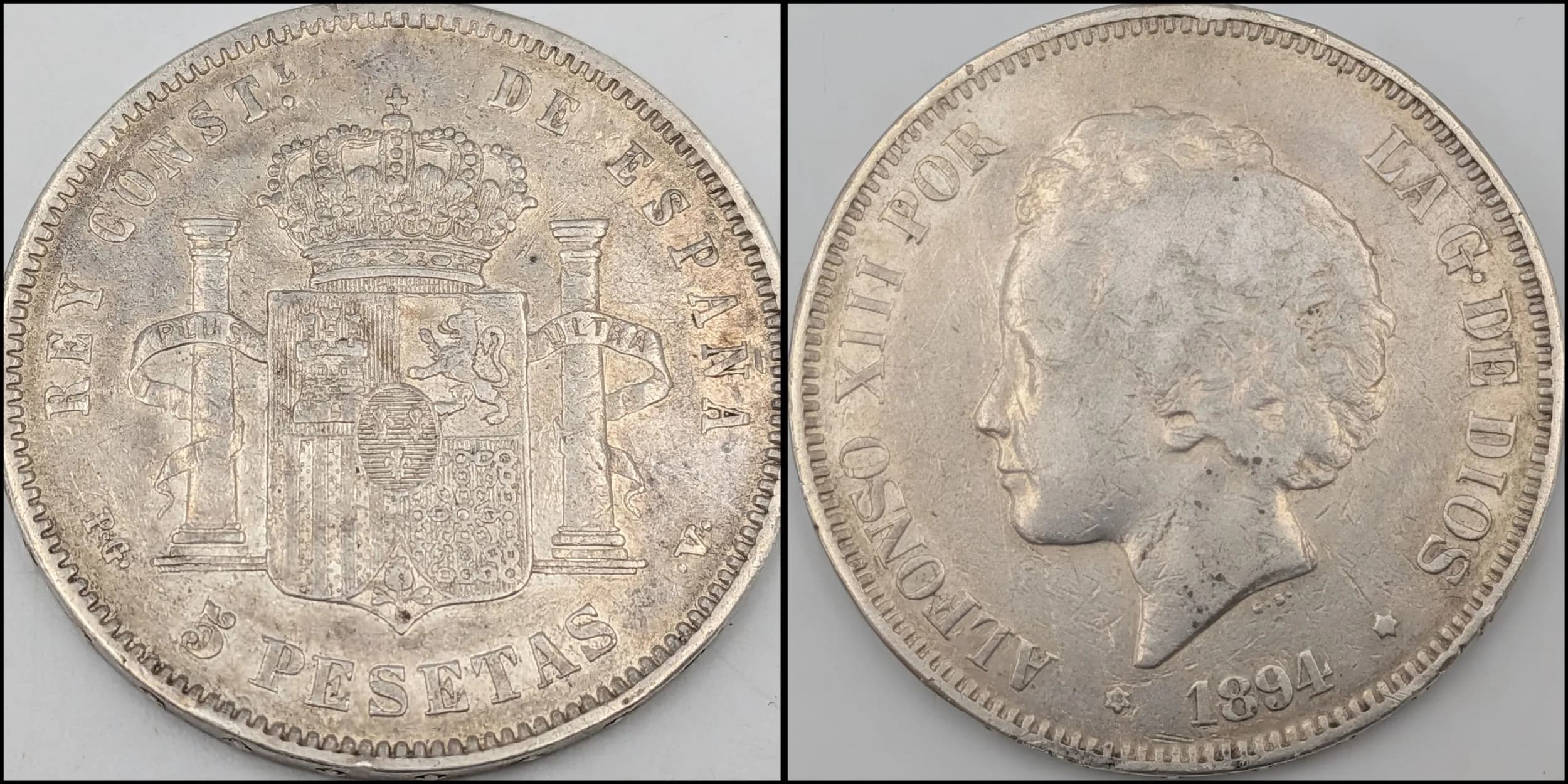 A Very Fine Condition, Scarce Date 1894 King Alfonso, Spain Silver 5 Peseta Coin. Graded on the Sheldon Scale, shows King Alfonso as a toddler. 900 Silver. 24.79 grams.
