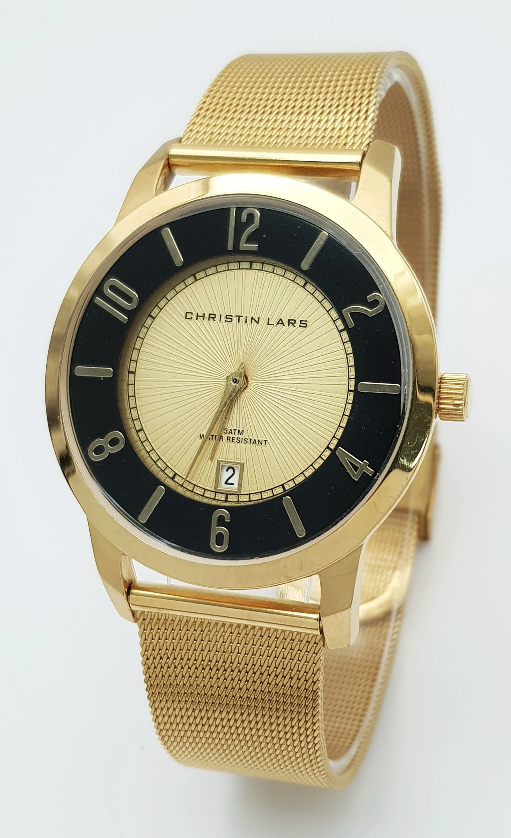 A CHRISTIAN LARS, YELLOW GOLD TONE, MESH BRACELET WATCH. IN FULL WORKING ORDER. NEW BATTERY FITTED RECENTLY. S/A 1694 - 3