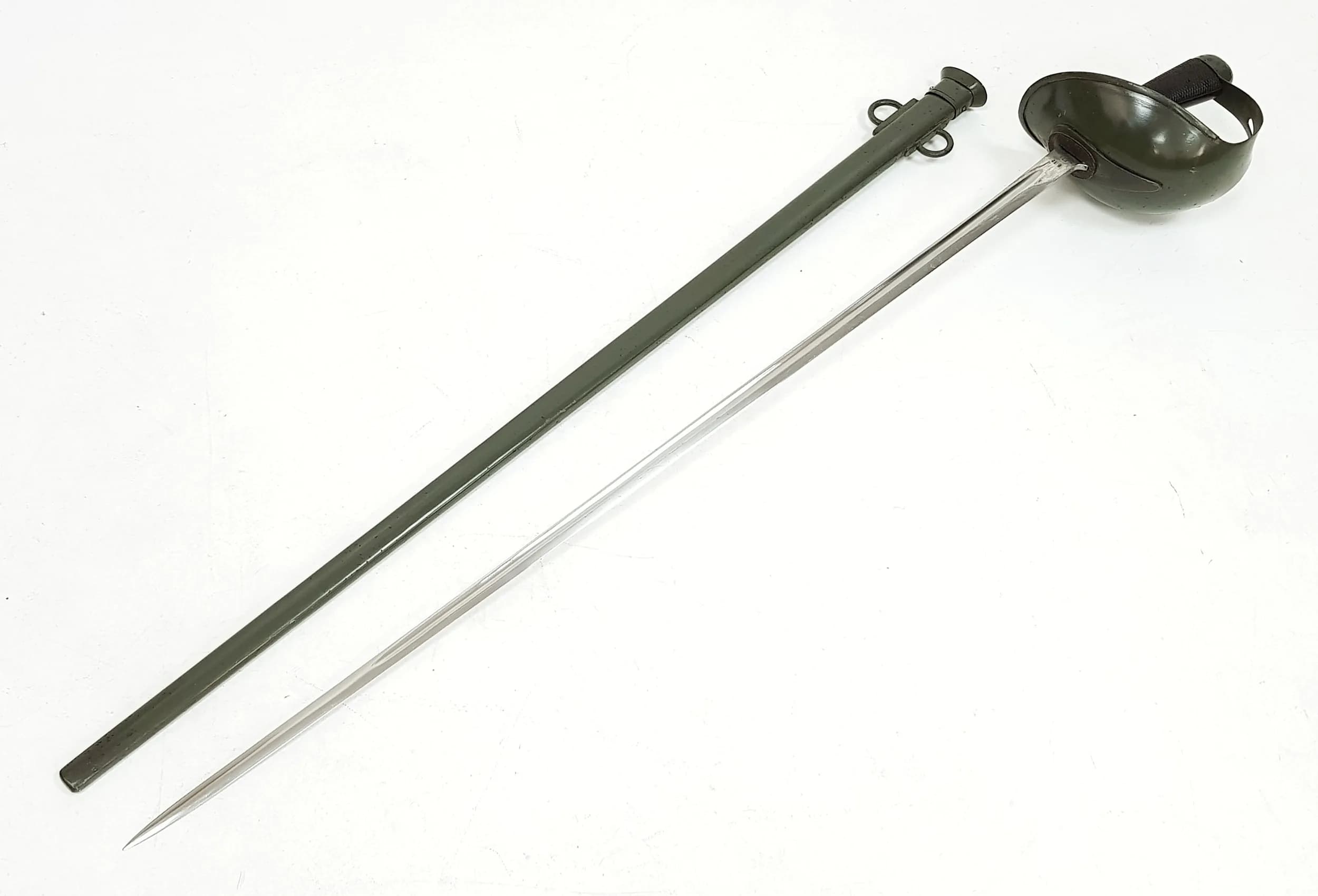 An Indian (service) British Army Pattern 1908 Cavalry Sword. Chequered wooden pistol form grip. Full bowl steel guard. Steel scabbard. Green finish. 110cm total length. UK Mainland shipping only or arrange a courier.