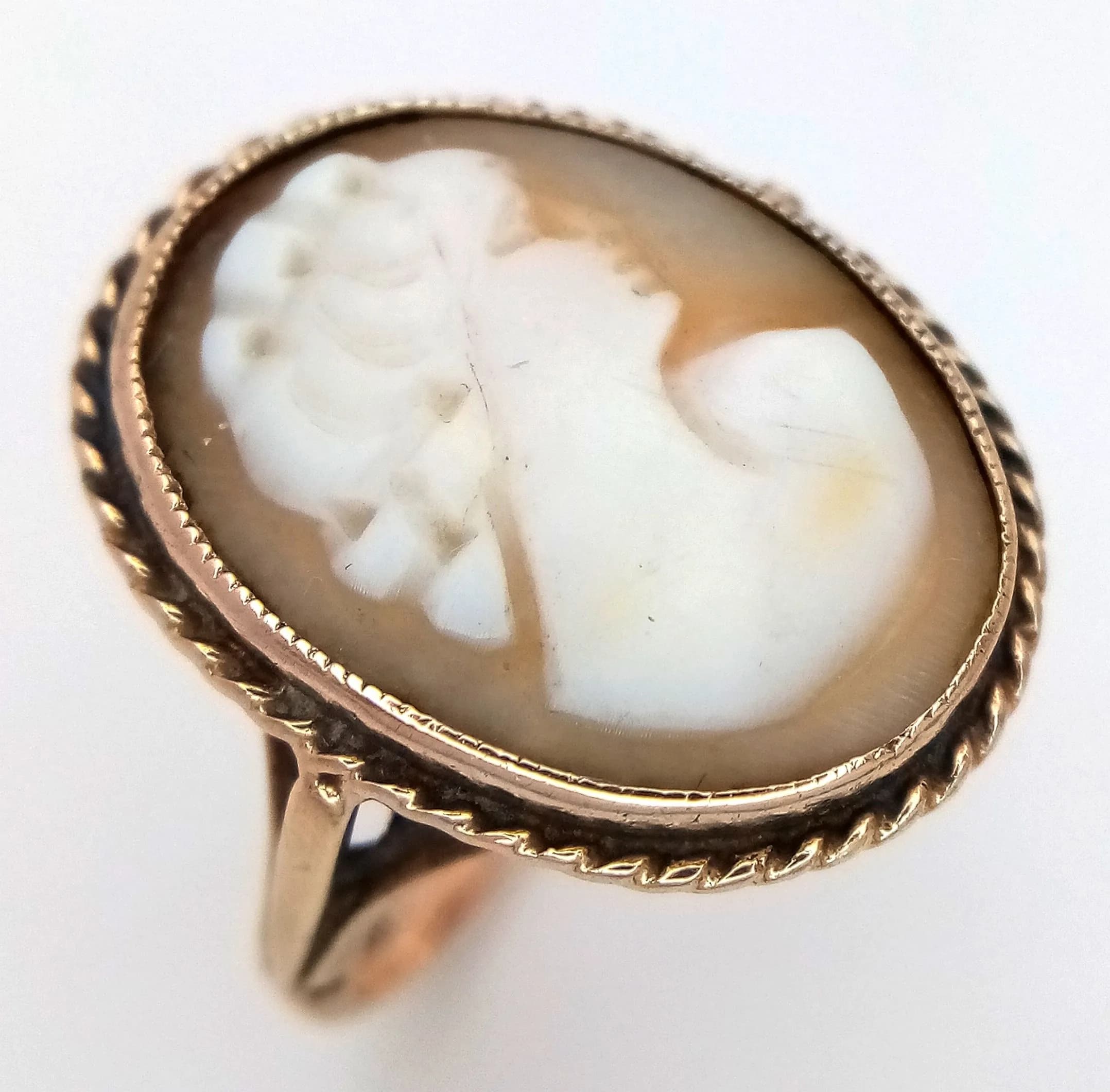 A 9K Yellow Gold Cameo Ring. 20mm cameo. Size O 1/2. 3.8g total weight.