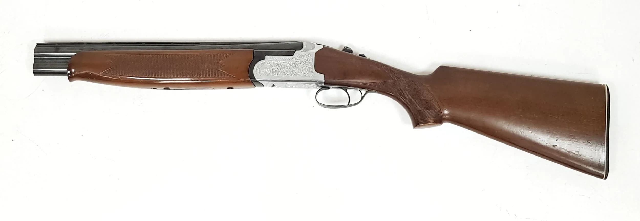 A Deactivated Lanbar Over and Under 12 Gauge Sawn-Off Shotgun. 15 inch barrel length. EU deactivation certificate. EU/UK sales only - Not Holland. UK Mainland shipping only or arrange a courier.