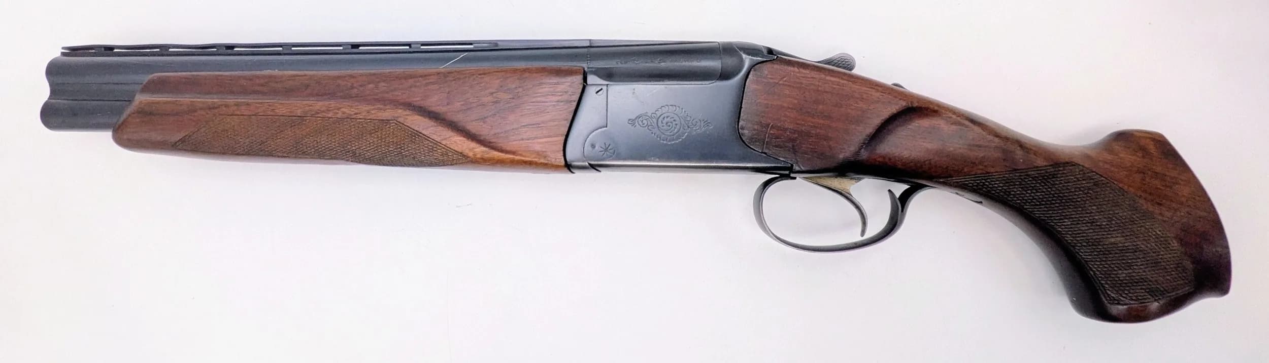 A Deactivated Baikal 12 Gauge Sawn-Off Shotgun. 14.5 inch barrel length. EU deactivation certificate. EU/UK sales only - Not Holland. UK Mainland shipping only or arrange a courier.