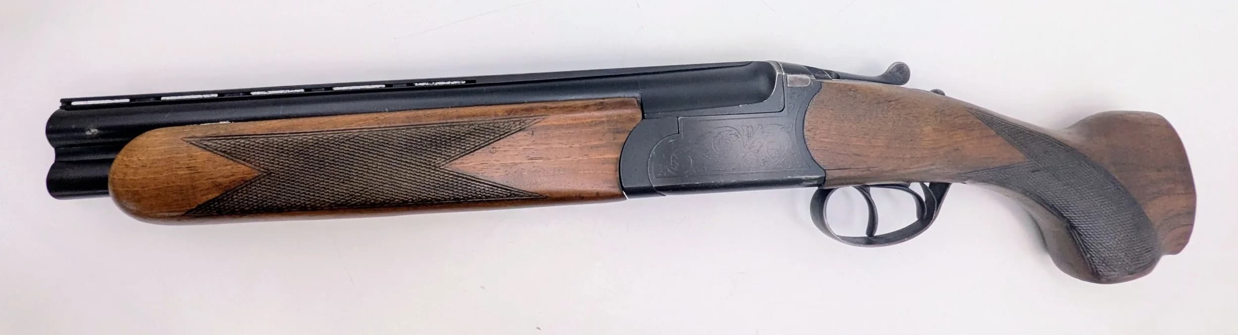A Deactivated Spanish Over and Under 12 Gauge Sawn-Off Shotgun. 13.5 inch barrel length. EU deactivation certificate. EU/UK sales only - Not Holland. UK Mainland shipping only or arrange a courier.