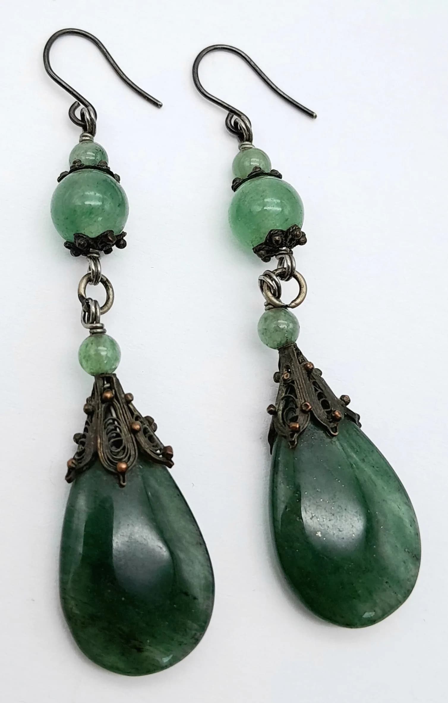 A Vintage Pair of Green Chalcedony and Aventurine Hand-Crafted Earrings. 6.5cm drop, 1.4cm Wide, Ornate Detailing. Combined weight 8.8 grams.