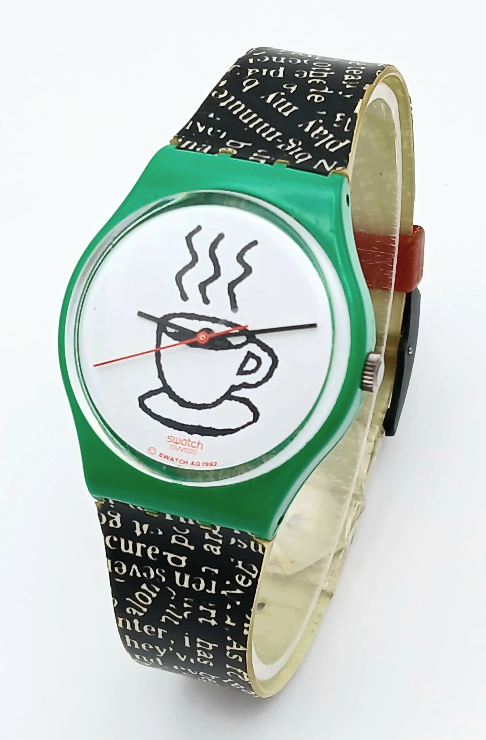 A Swatch, Cappuccino, Rubber Strap Watch. Strap And Buckle Need Attention But Wearable. In Full Working Order. New Battery Fitted Recently.