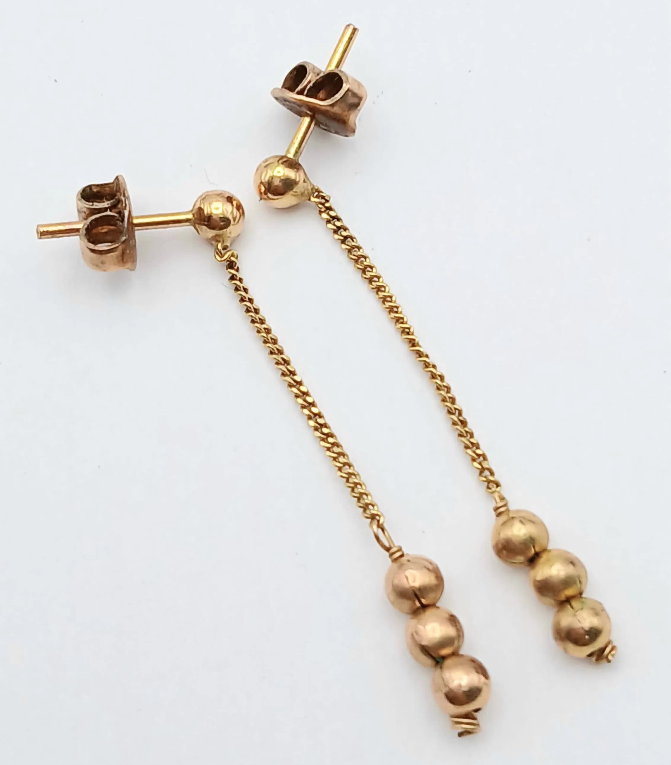 A Pair of 9K Yellow Gold, Ball Drop earrings. 3.5cm drop. 1.4g.