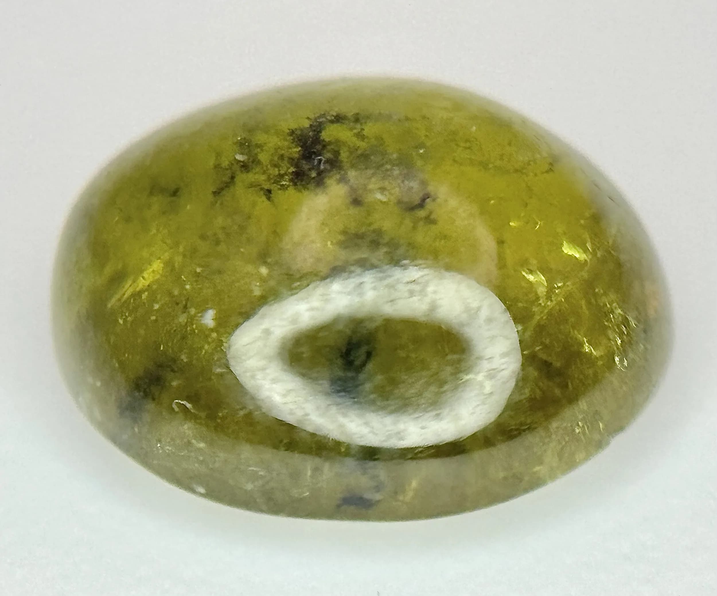 A 3.20ct Pakistan Origin Grossular Garnet Gemstone - Oval Cabochon. With certificate. TR06.