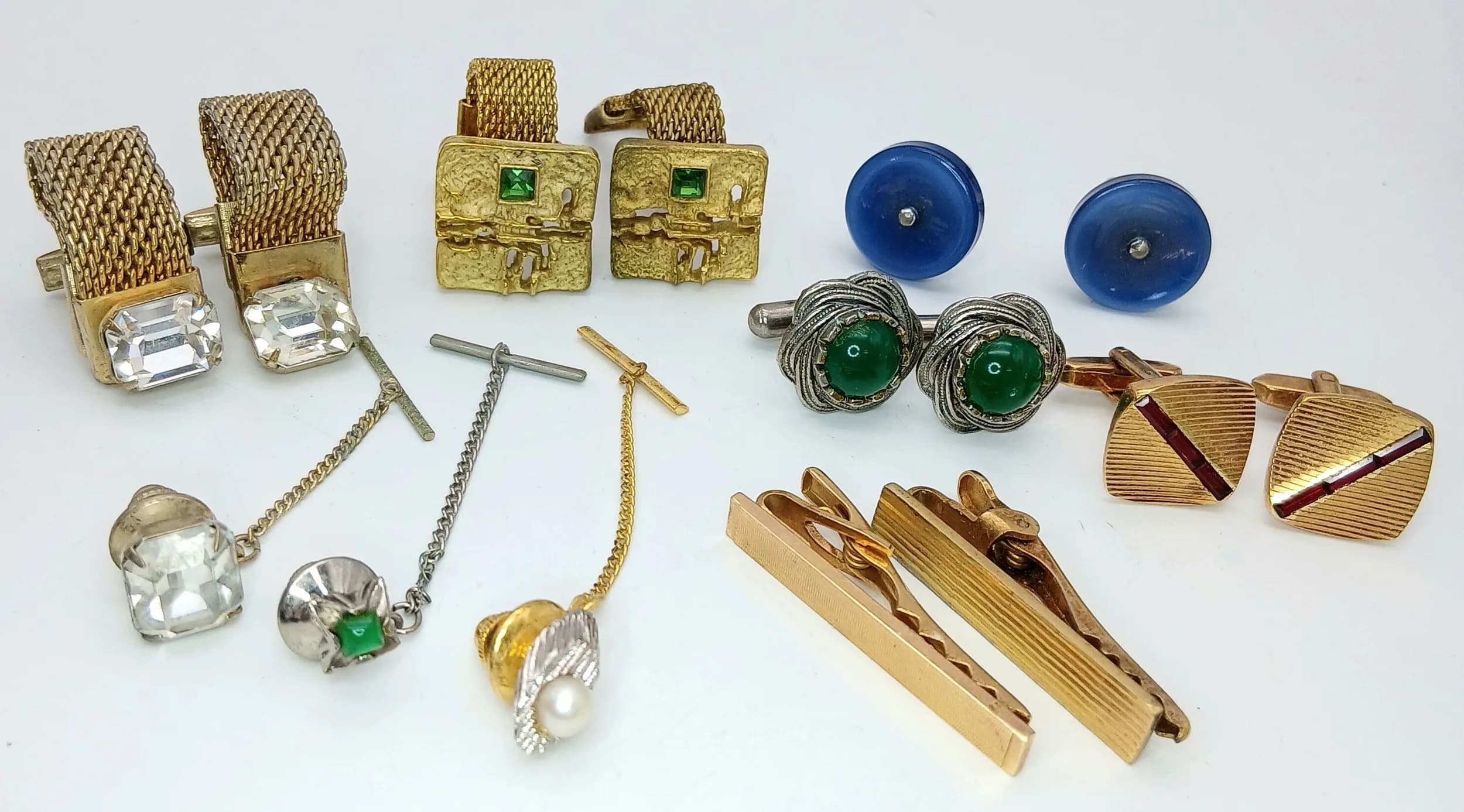 A Collection of Vintage Cufflinks and Tie-Clips