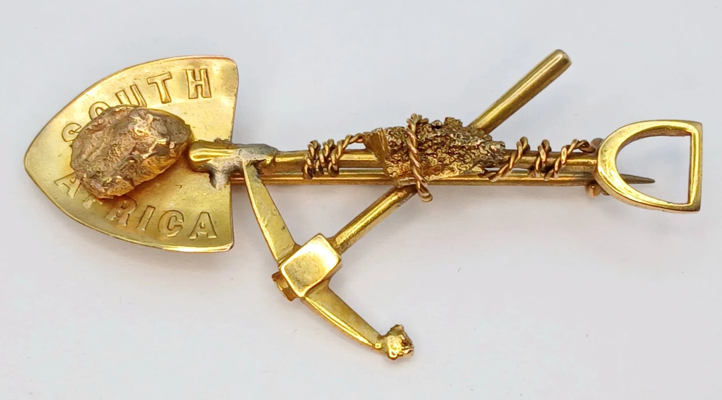 An Antique 9K Yellow Gold South African Mining Brooch Pendant