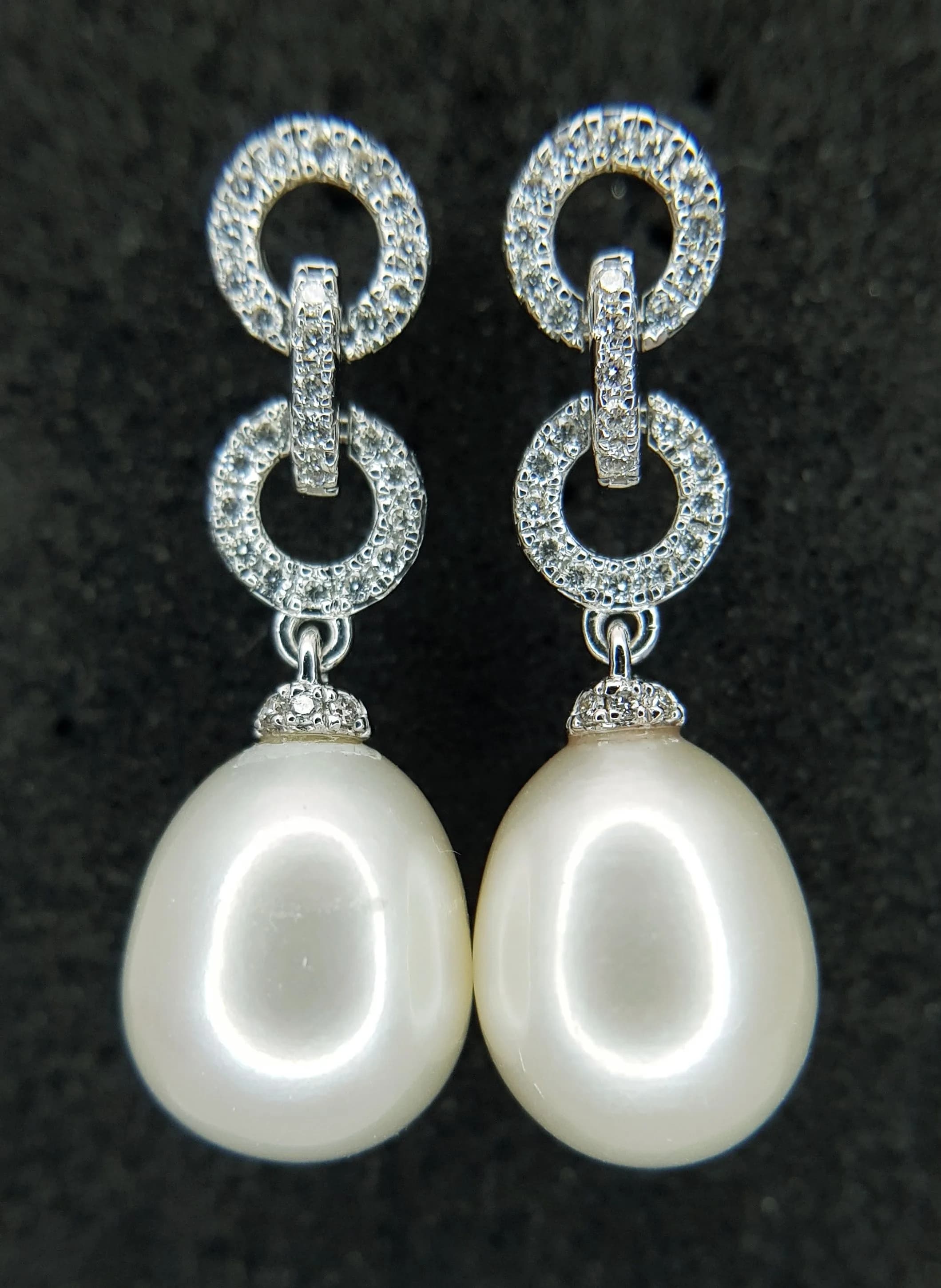 A Pair of 18K White Gold, Pearl and Diamond Drop Earrings